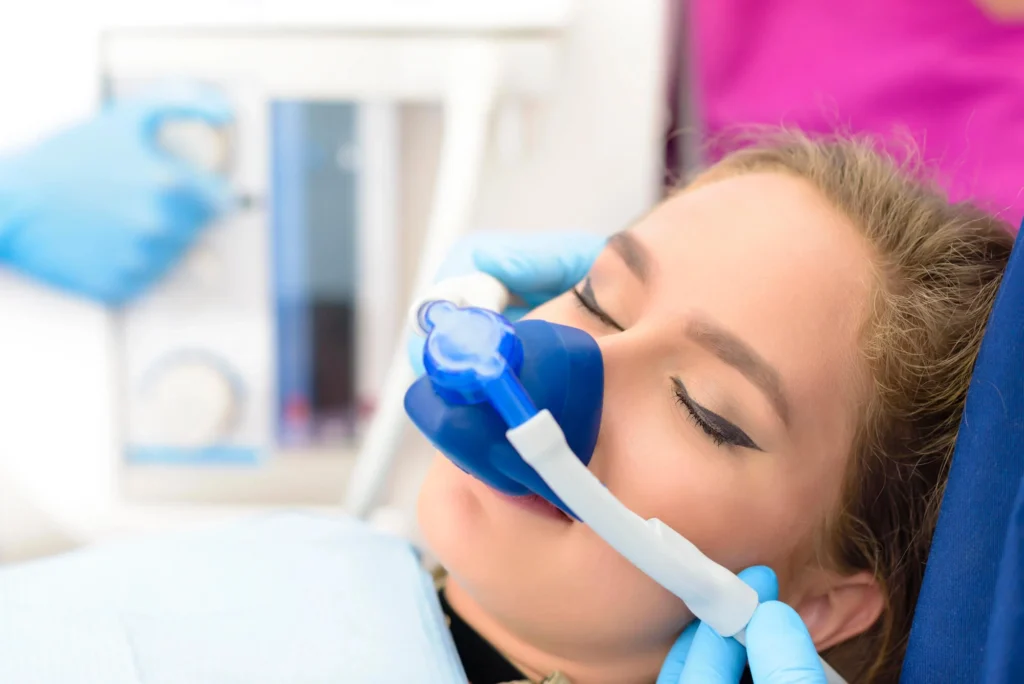 Woman receiving sedation for sleep dentistry in New York City.